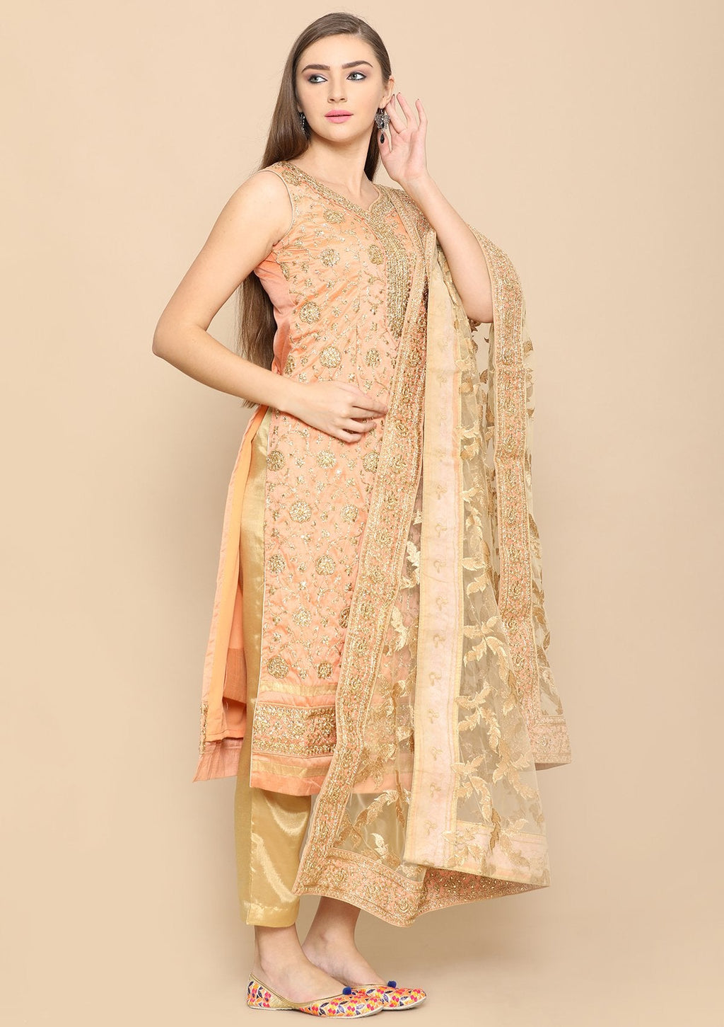 Peach and gold salwar suit