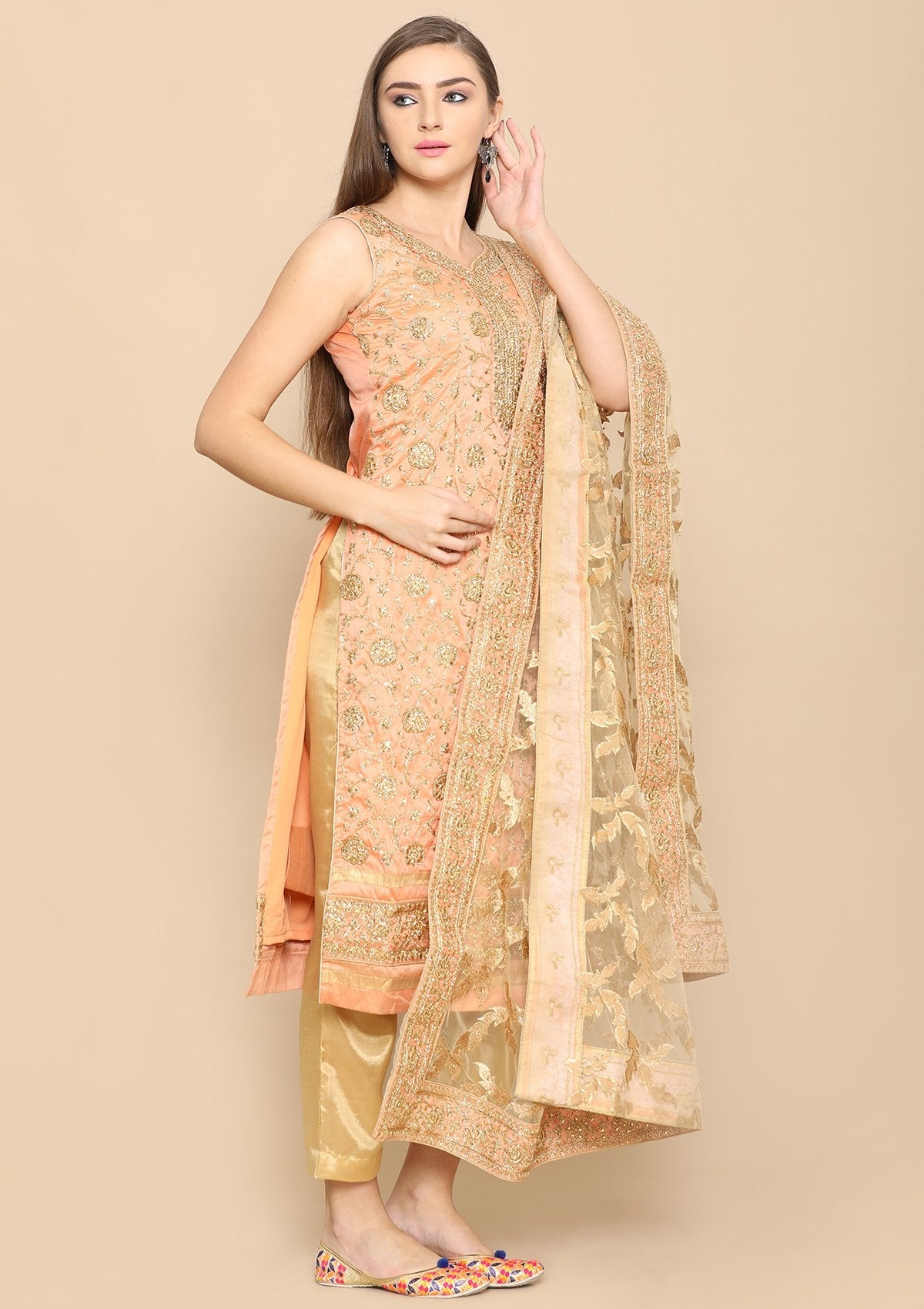 Peach and gold salwar suit