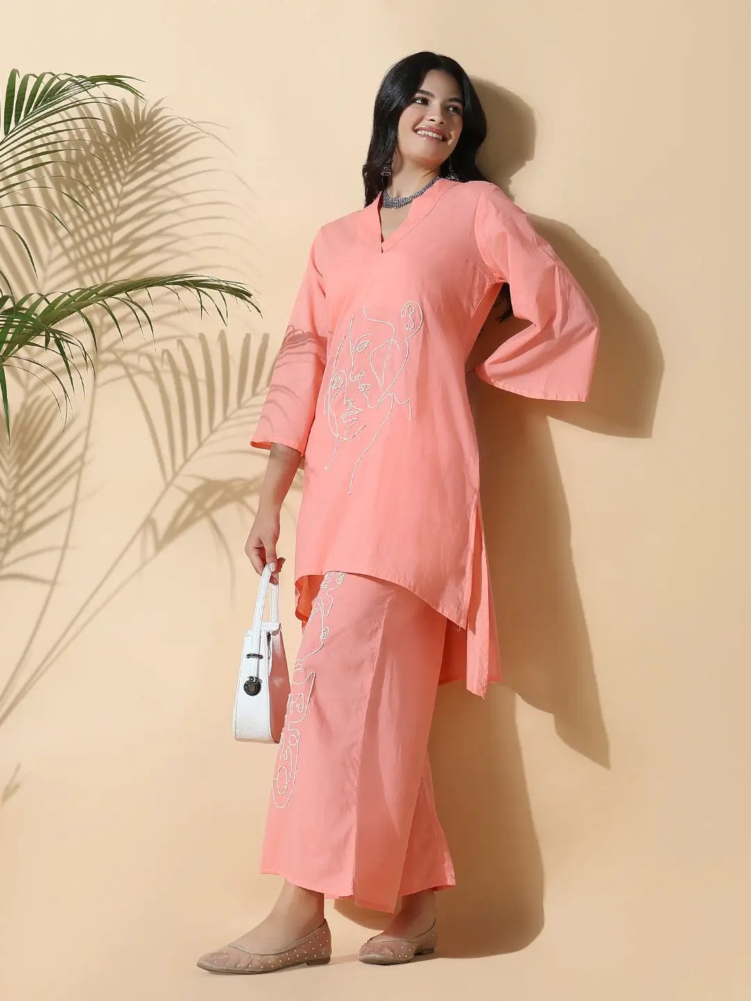 Women's Abstract A-Line Thread Work Peach Kurta with Palazzos