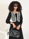 Women's Solid Black Fit and Flare Knee Length Dress with Attached Shrug