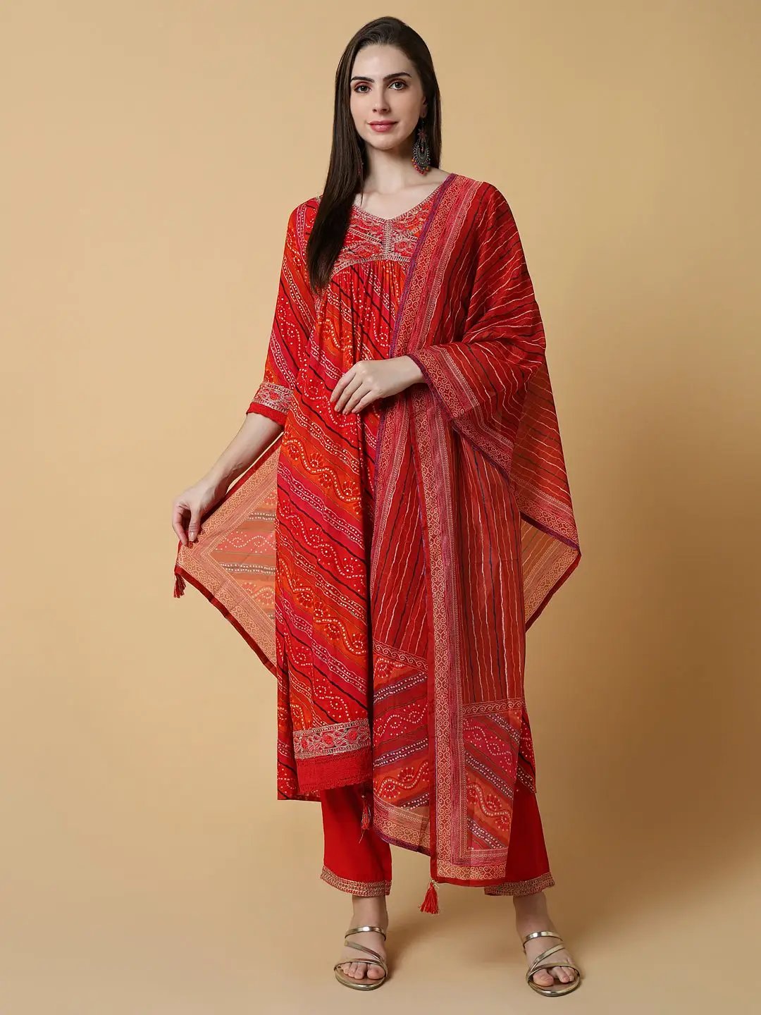 Women's Graphic Orange A-Line Kurta Set with Dupatta & Potli Bag