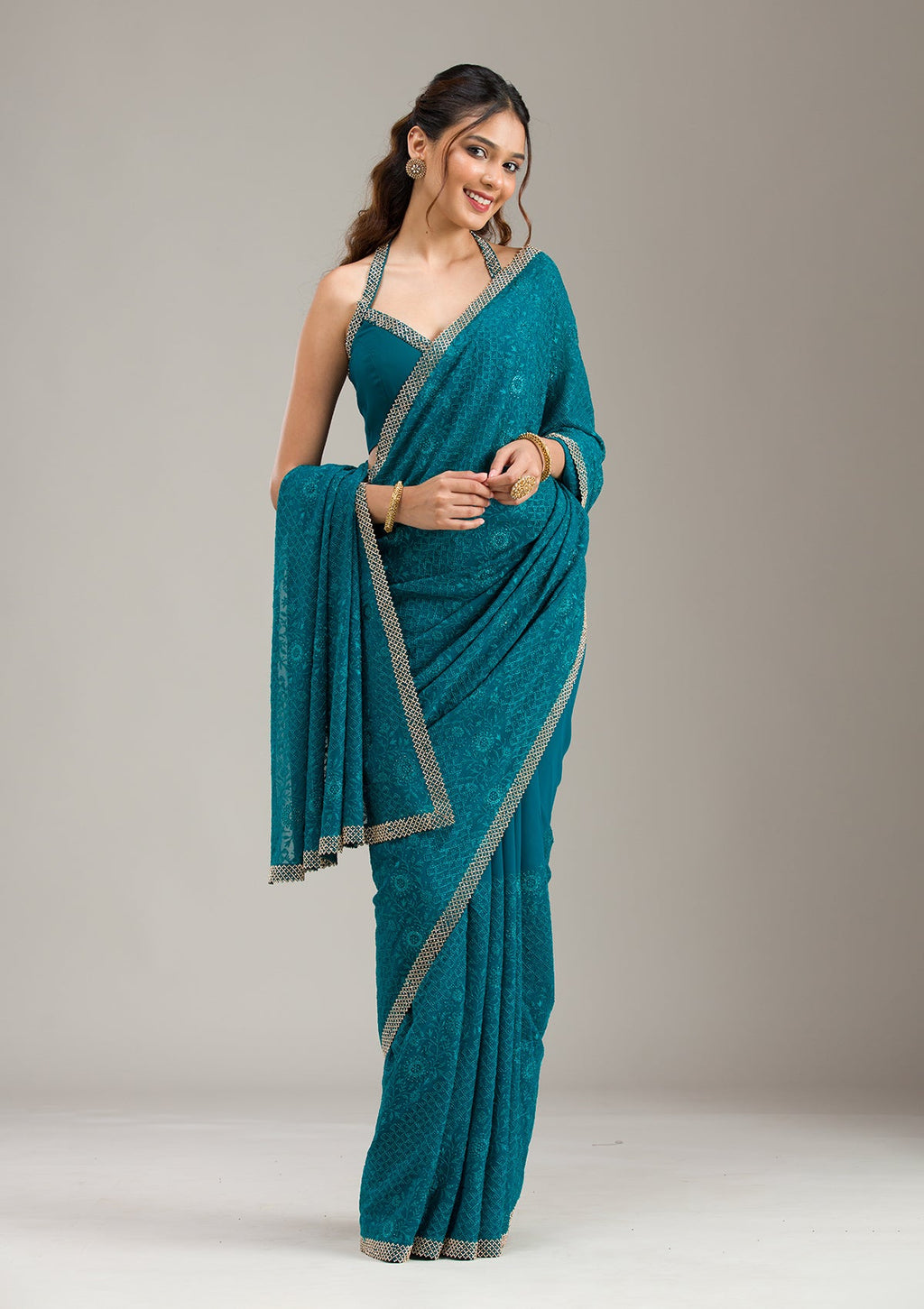 Teal Green Threadwork Georgette Saree