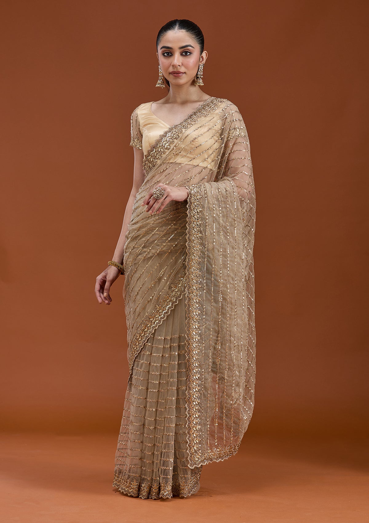 Beige Sequins Net Saree