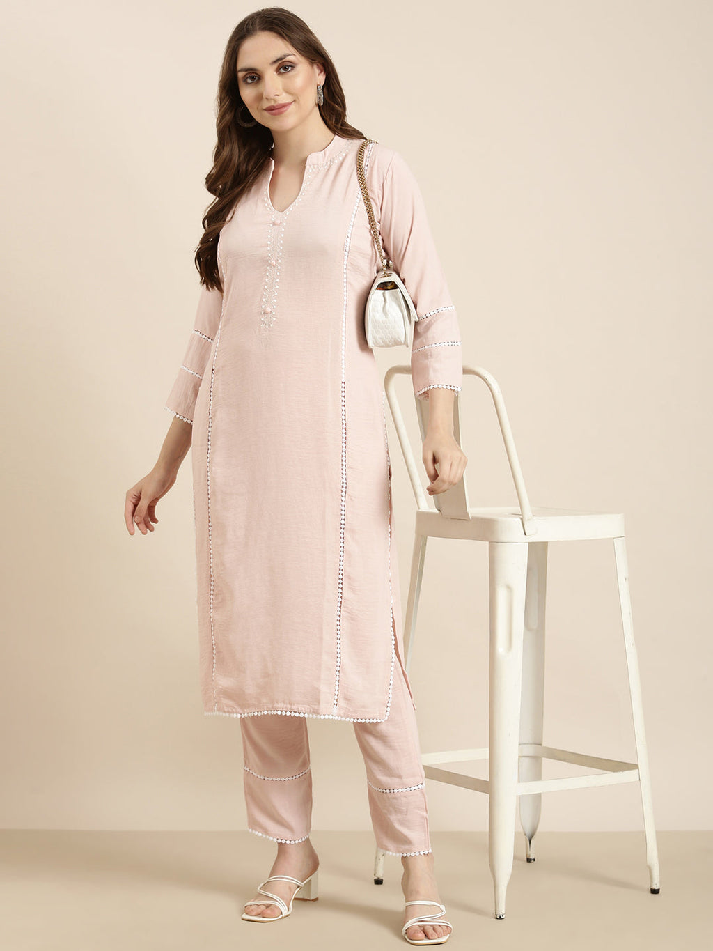 Women's Straight Peach Solid Kurta Sets With Trousers