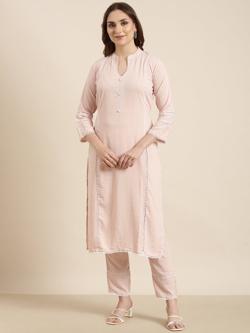 Women's Straight Peach Solid Kurta Sets With Trousers