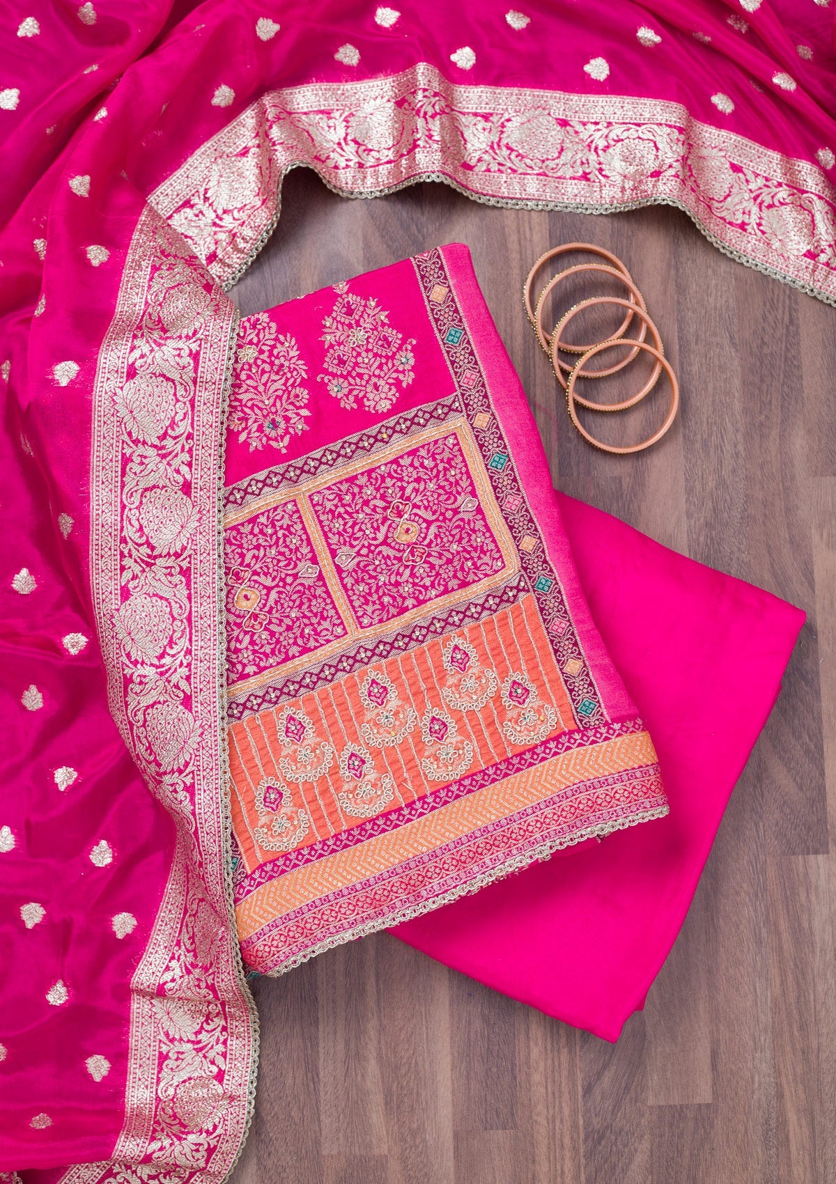 Rani Pink Cutdana Semi Crepe Unstitched Salwar Suit