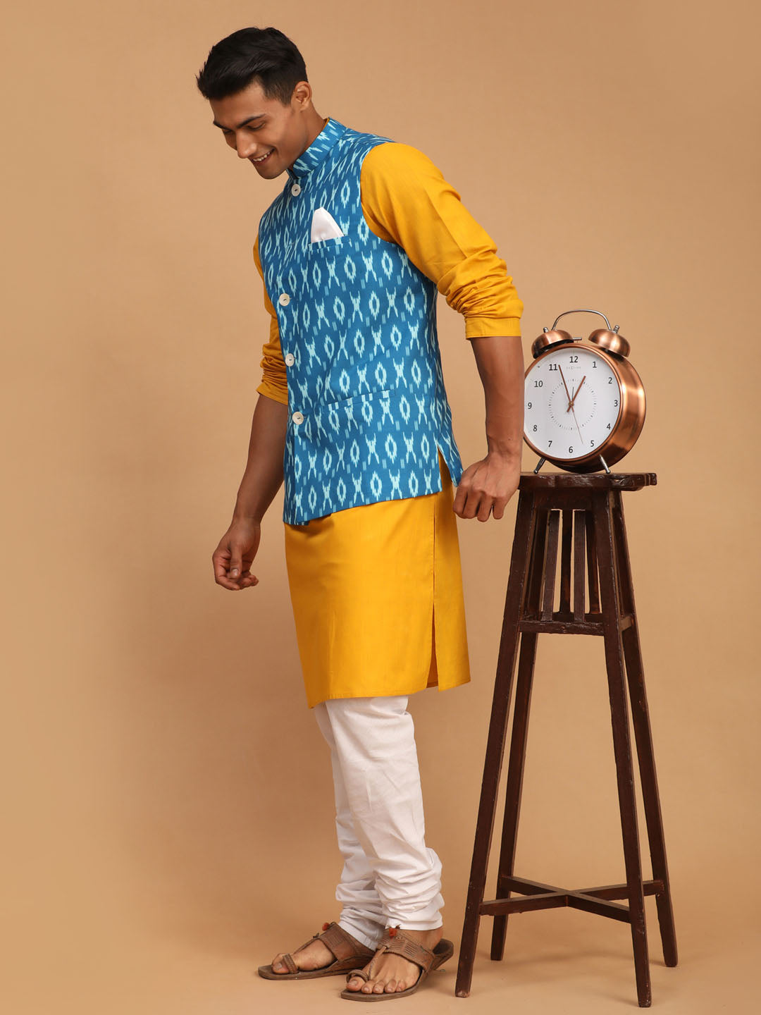 Men's Turquoise Ikkat Printed Cotton Nehru Jacket With Mustard Kurta And White Pyjama Set