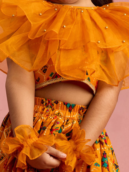 Girls Mustard Patola Print Rayon Lehenga Choli Set with Accessories & Ruffled Hand Gloves