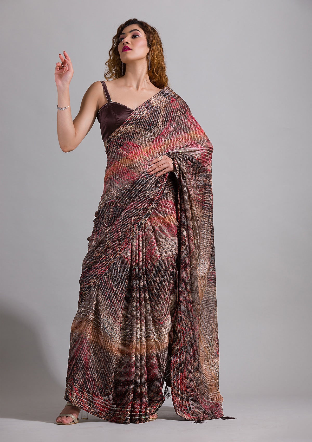 Brown Swarovski Semi Crepe Saree