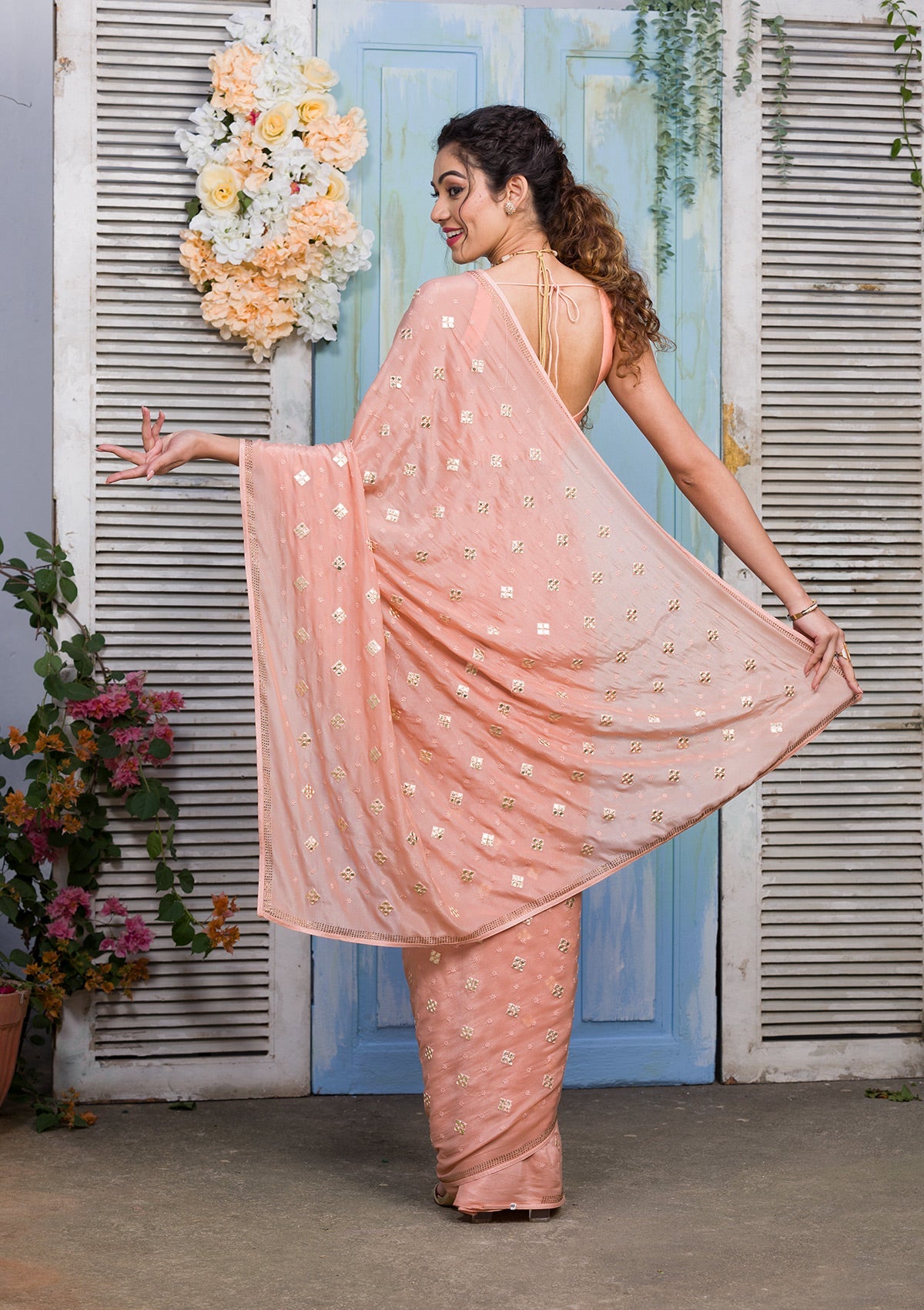 Peach Swarovski Semi Crepe Designer Saree