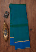 Peacock Blue Zariwork Pure Silk Unstitched Saree