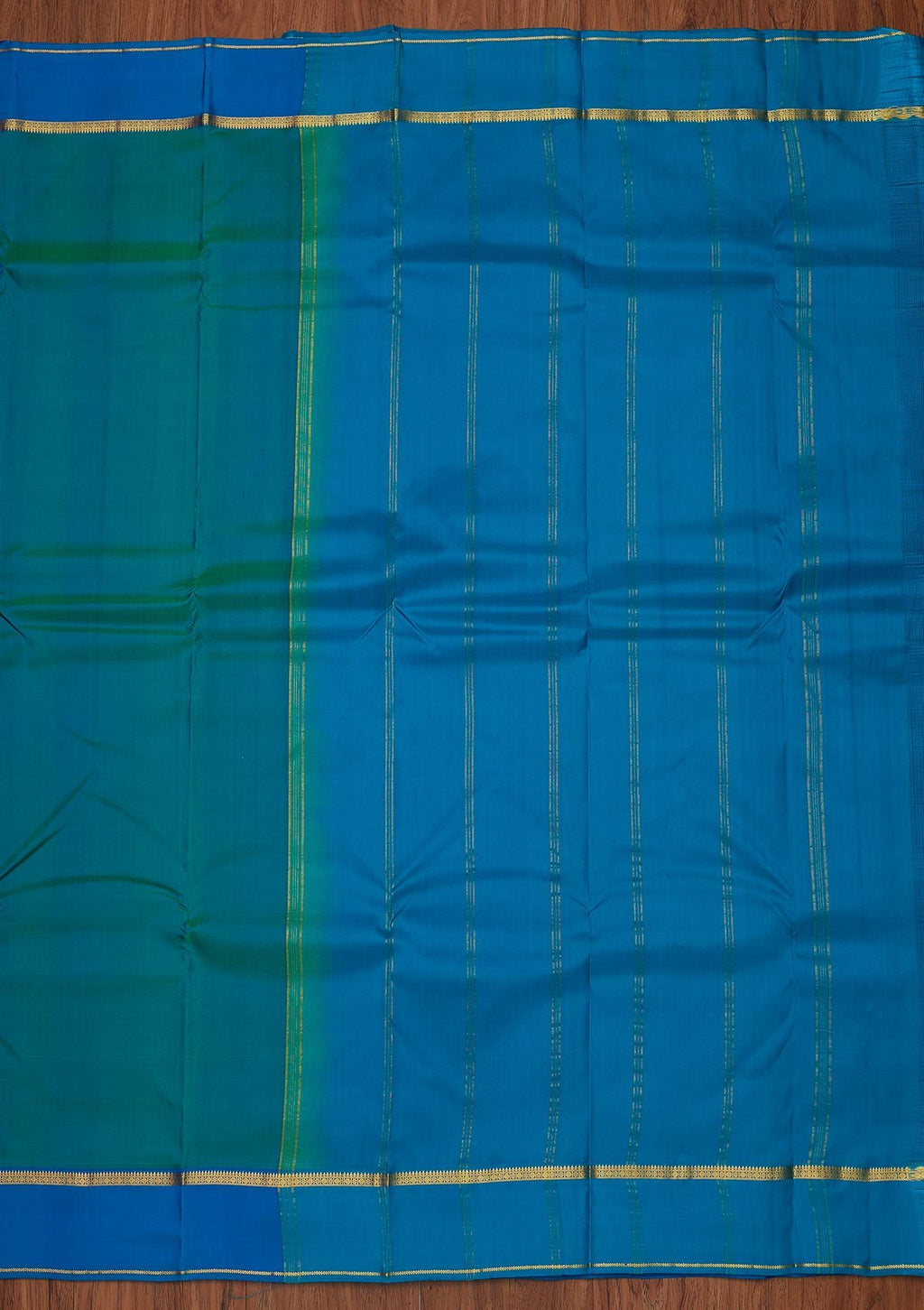 Peacock Blue Zariwork Pure Silk Unstitched Saree
