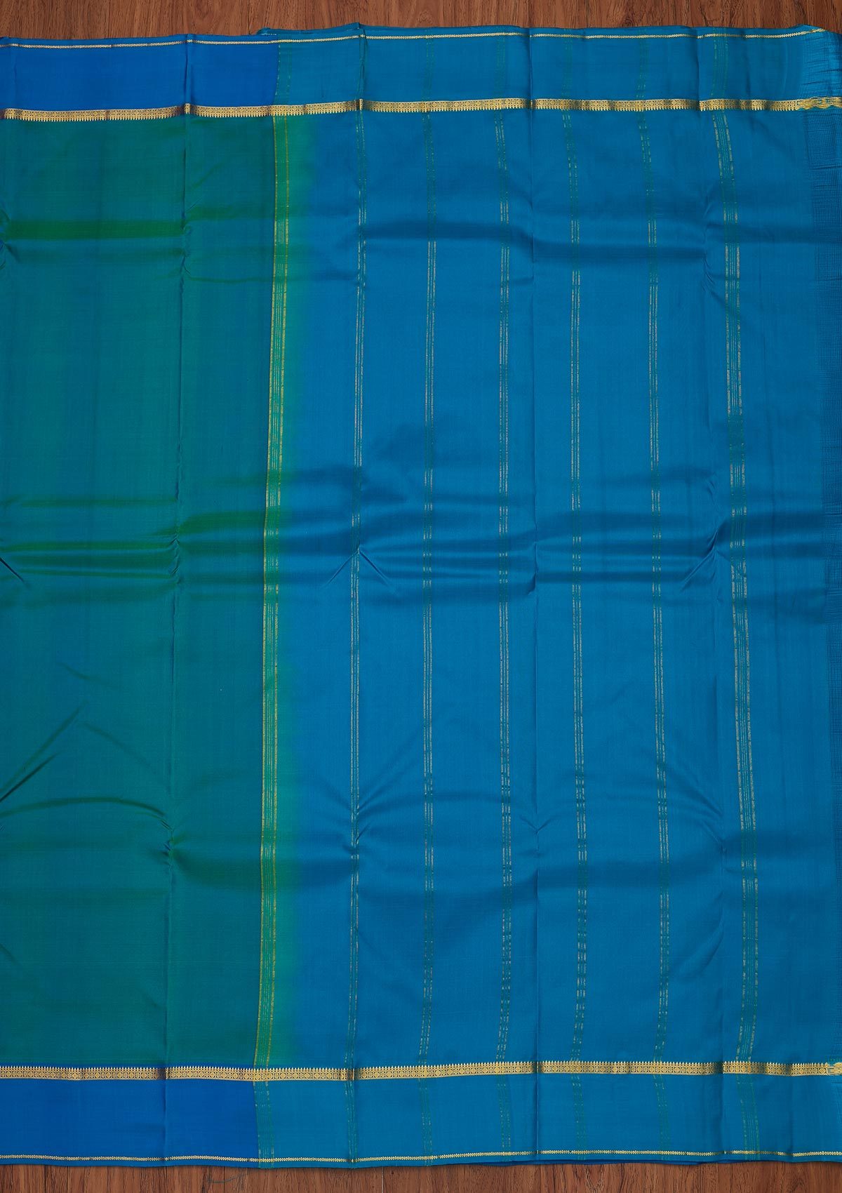 Peacock Blue Zariwork Pure Silk Unstitched Saree