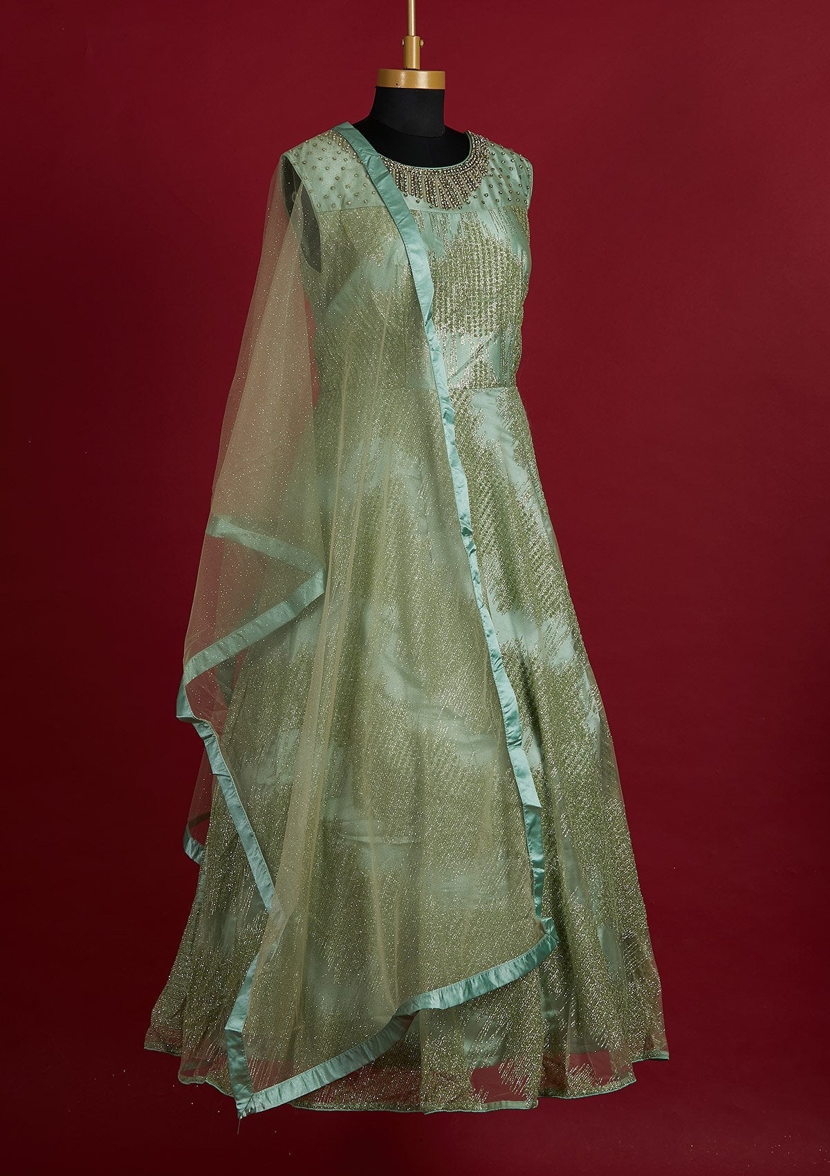 Pista Green Glitter Net Designer Gown