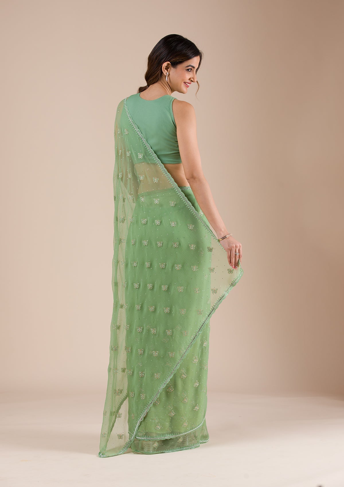 Pista Green Silver Stonework Georgette Saree