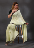 Pista Green Swarovski Georgette Saree