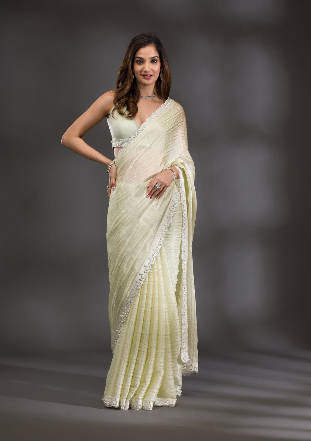 Pista Green Swarovski Georgette Saree