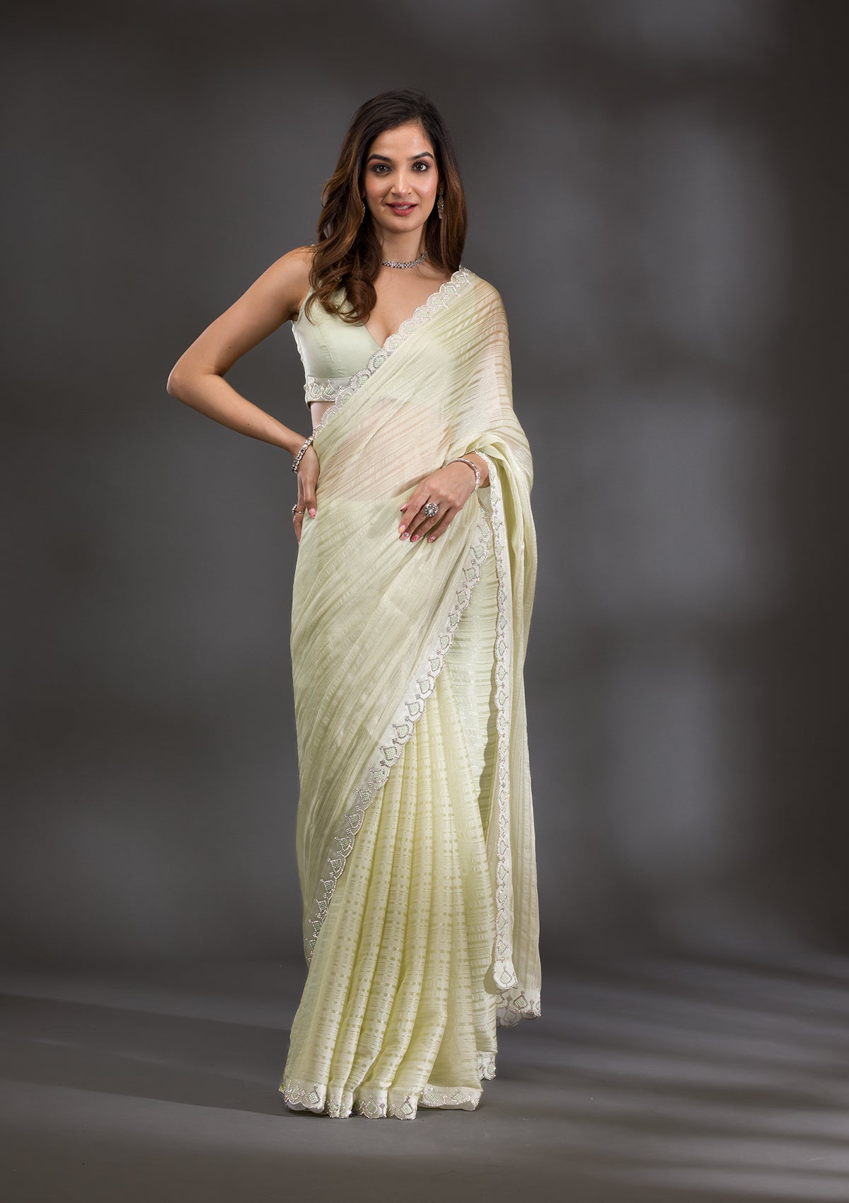 Pista Green Swarovski Georgette Saree