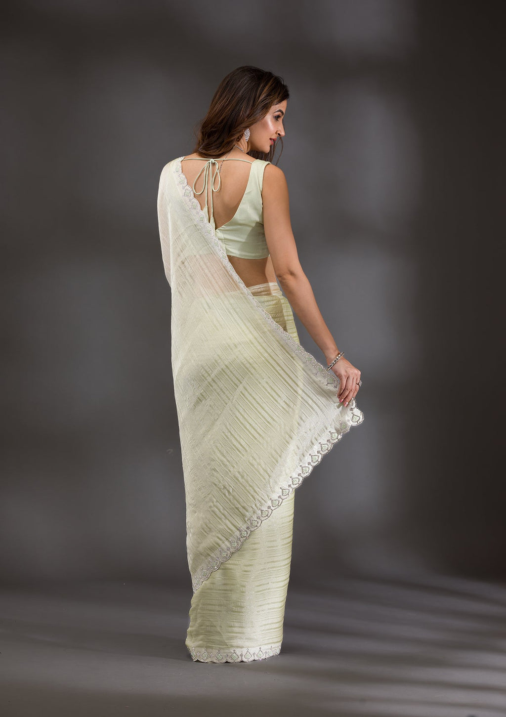 Pista Green Swarovski Georgette Saree