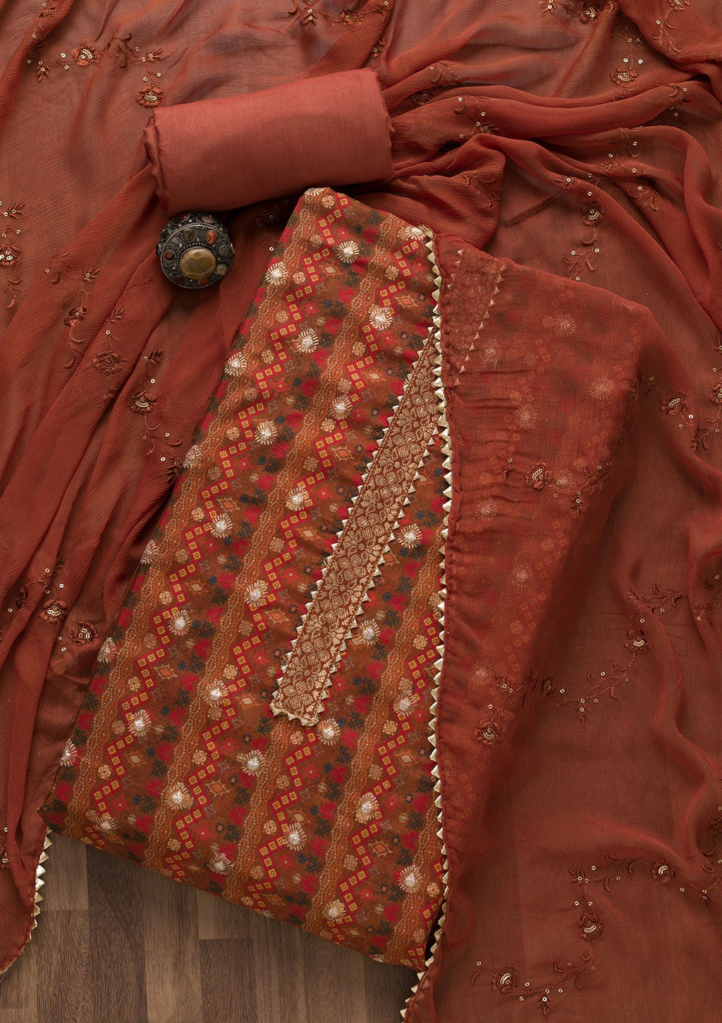 Rust Zariwork Semi Crepe Unstitched Salwar Suit