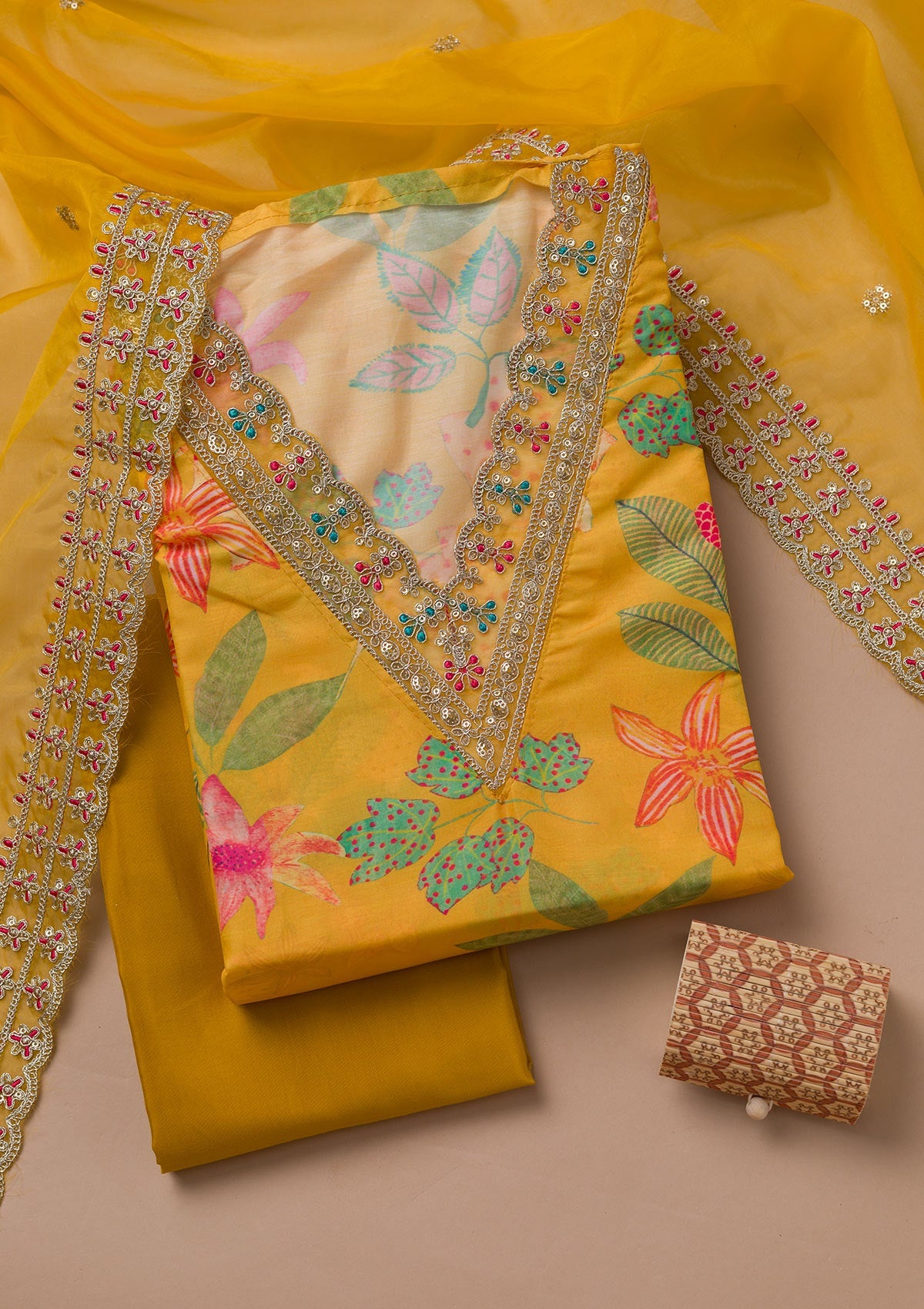 Yellow Printed Semi Crepe Unstitched Salwar Suit